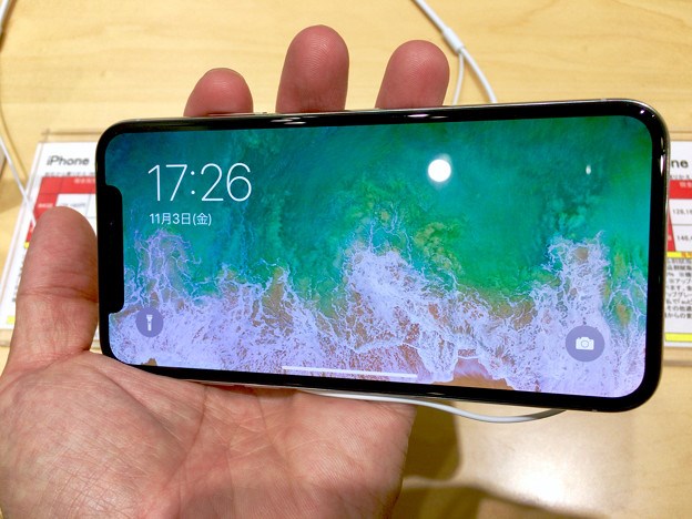 新购苹果iPhone X被官方鉴定经非授权改装，苏宁回应称先行退货