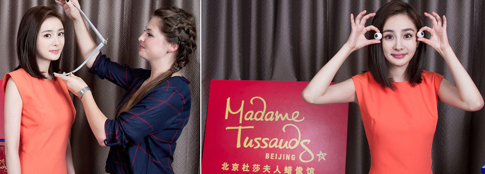  杨幂为自己蜡像量身 手拿眼珠卖萌 