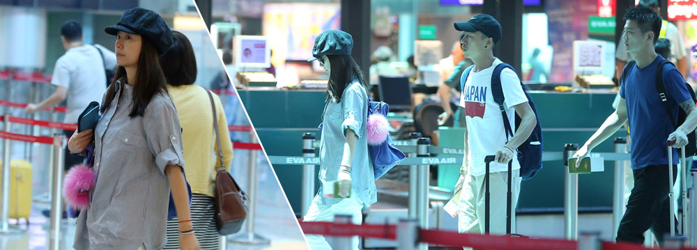 林心如素颜独自搭飞机 衣着宽松孕味浓
