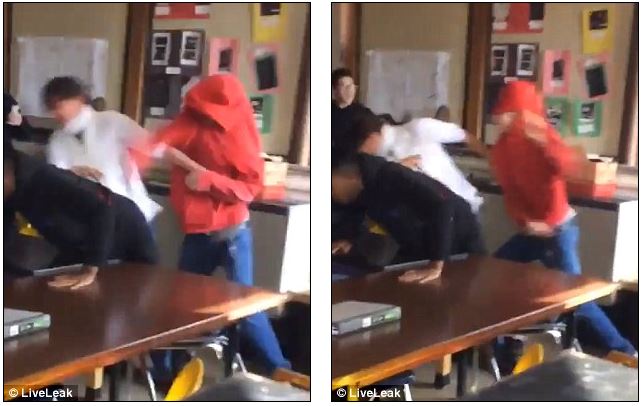 当看到老师被打时 这位男生第一时间冲上去保护她