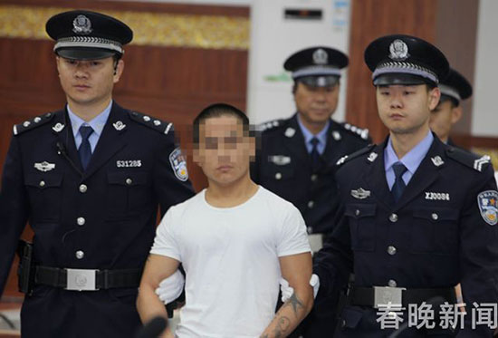 杀害缉毒民警李敬忠的疑凶13日在西双版纳受审