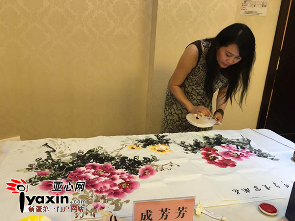 吐鲁番果之源logo揭牌及签约仪式暨书法名家笔会成功举办