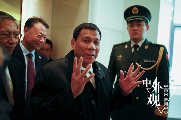 菲律宾总统访华 中国敞开大门助破冰