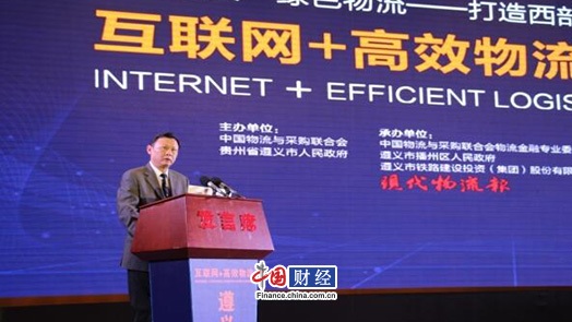 (何黎明)