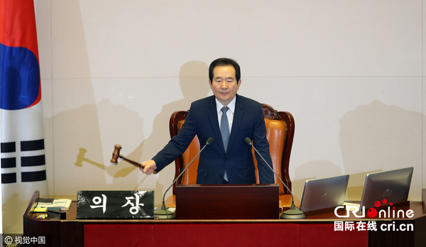 　　当地时间2016年12月9日，韩国首尔，韩国国会就总统朴槿惠弹劾案进行表决。图片来源：视觉中国