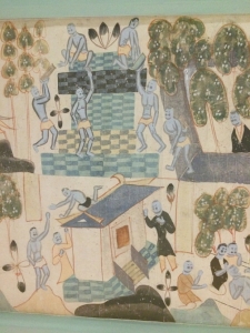 在《福田经变》图的右下角,可以找到画工的身影。