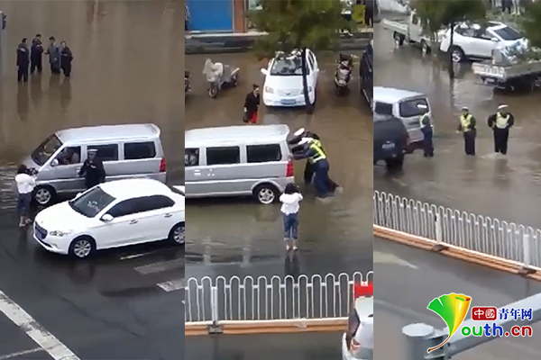 内蒙古交警被指雨中推车摆拍 官方：在拍微电影