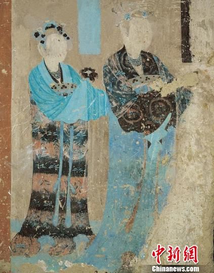 图为莫高窟第12窟晚唐时期《母子襦裙纹样》。敦煌研究院供图