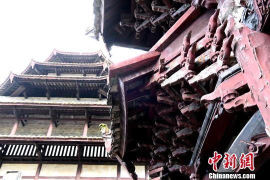 位于福建省上杭县的蛟洋文昌阁，建于清乾隆六年(1741年)，砖木结构、宝塔式的古建筑，为中国罕见的“悬臂梁”结构。　张斌　摄