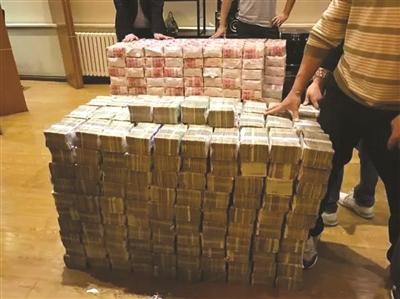 震惊！哈尔滨一传销嫌犯家中堆了7000万现金