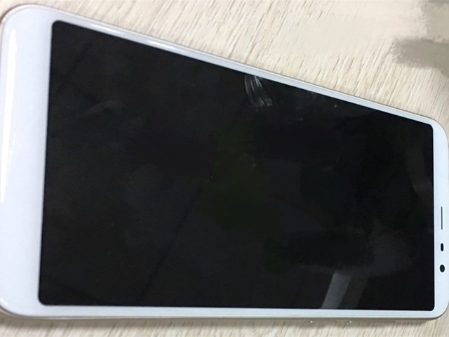 魅蓝新机谍照再现:正面Home键消失了