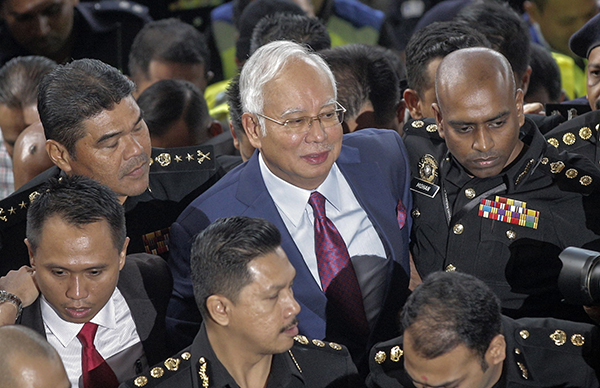 外媒：马来西亚前总理纳吉布对相关指控拒认罪