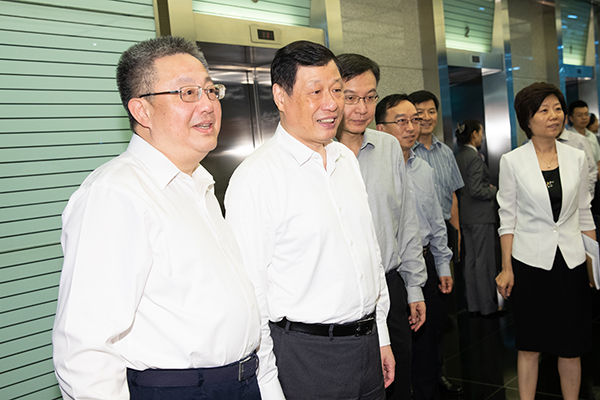 把上海建成国资国企综合改革示范区,应勇调研国际、国盛集团