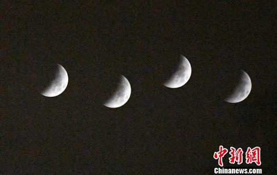 记者在福建福州上空拍摄的月全食天文奇观。(多重曝光) 刘可耕 摄