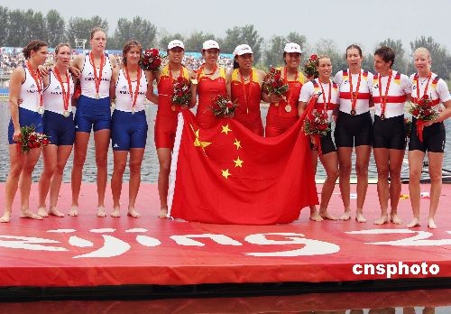 资料图：金紫薇和队友获北京奥运会冠军。