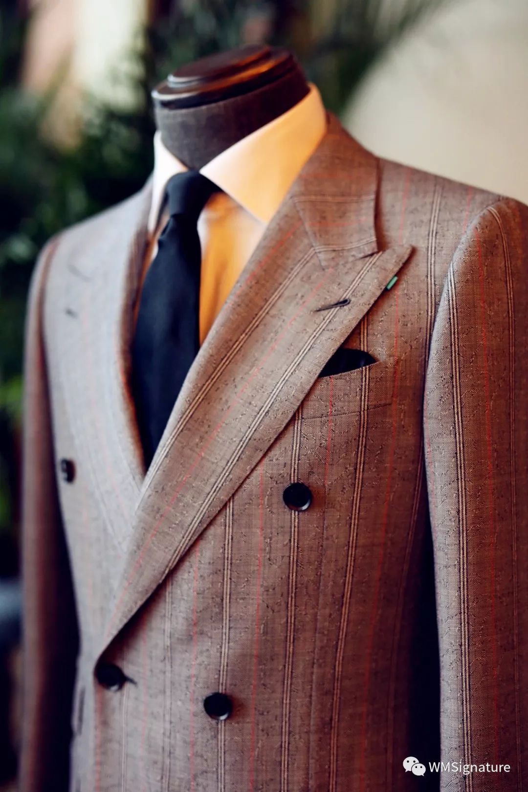 一个扣眼揭开一个行业真相西装的秘密